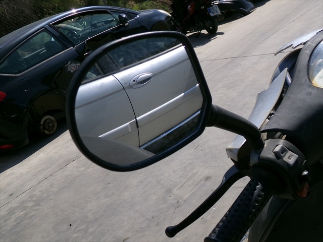 Retrovisor Izquierdo